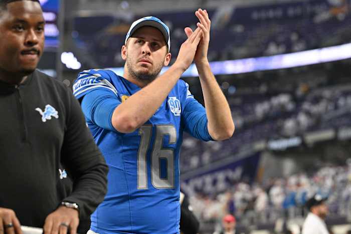 Lions quarterback Jared Goff walks off the field Sunday at U.S. Bank Stadium after Detroit clinched its first division title since 1993 with a win over the Vikings.